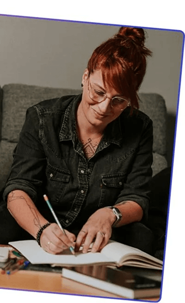 Woman writing in a notebook